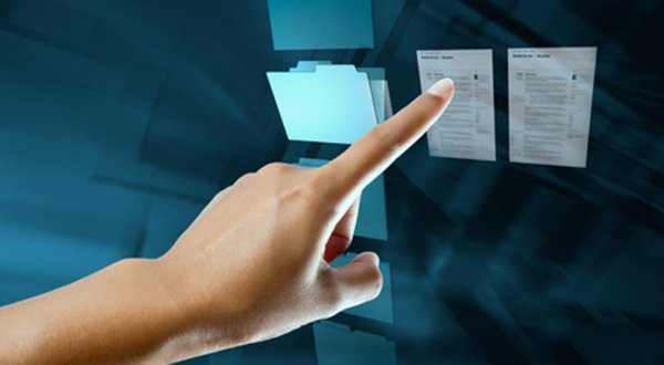 Hand pointing at documents